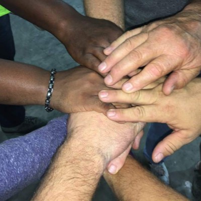 Truck Drivers hands working together in Trucking Logistics jobs in Nashville TN, Beacon Transport, a local truck company